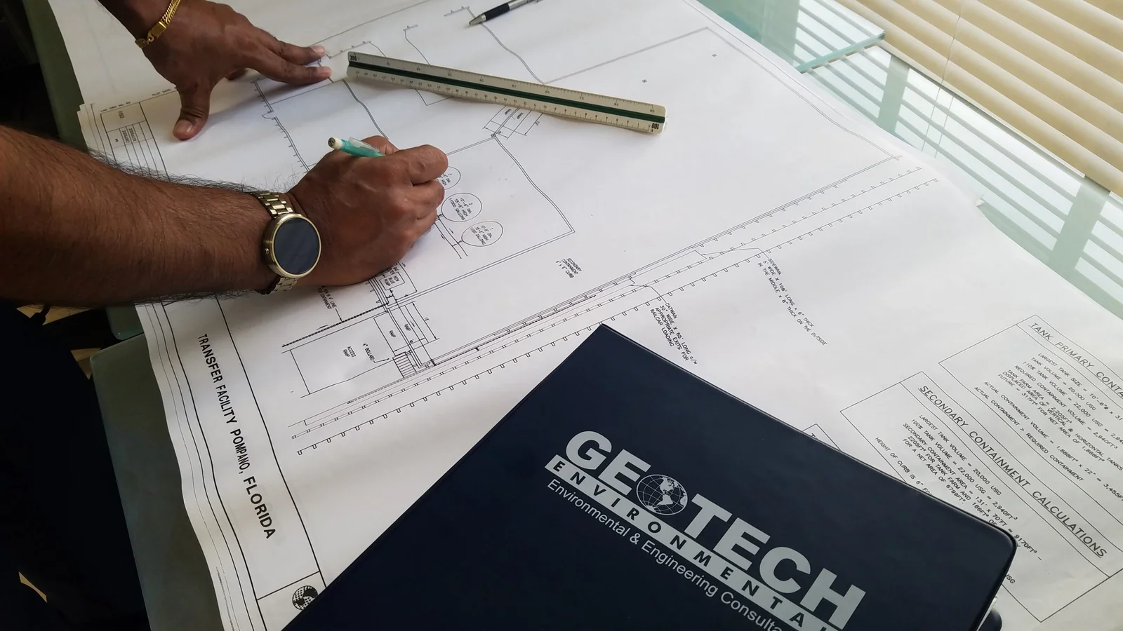 GeoTech engineer reviewing a site plan for a Florida facility